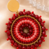 ChatGPT Image 14 ago 2026, 17_17_20 Aros Mandala Rojo & Dorado – Acero Inoxidable y Mostacillas