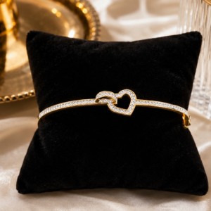 Pulsera Rígida de Acero Inoxidable Corazón Entrelazado con Cristales – Dorada